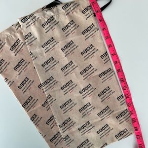 Gucci All over logo print dust bag